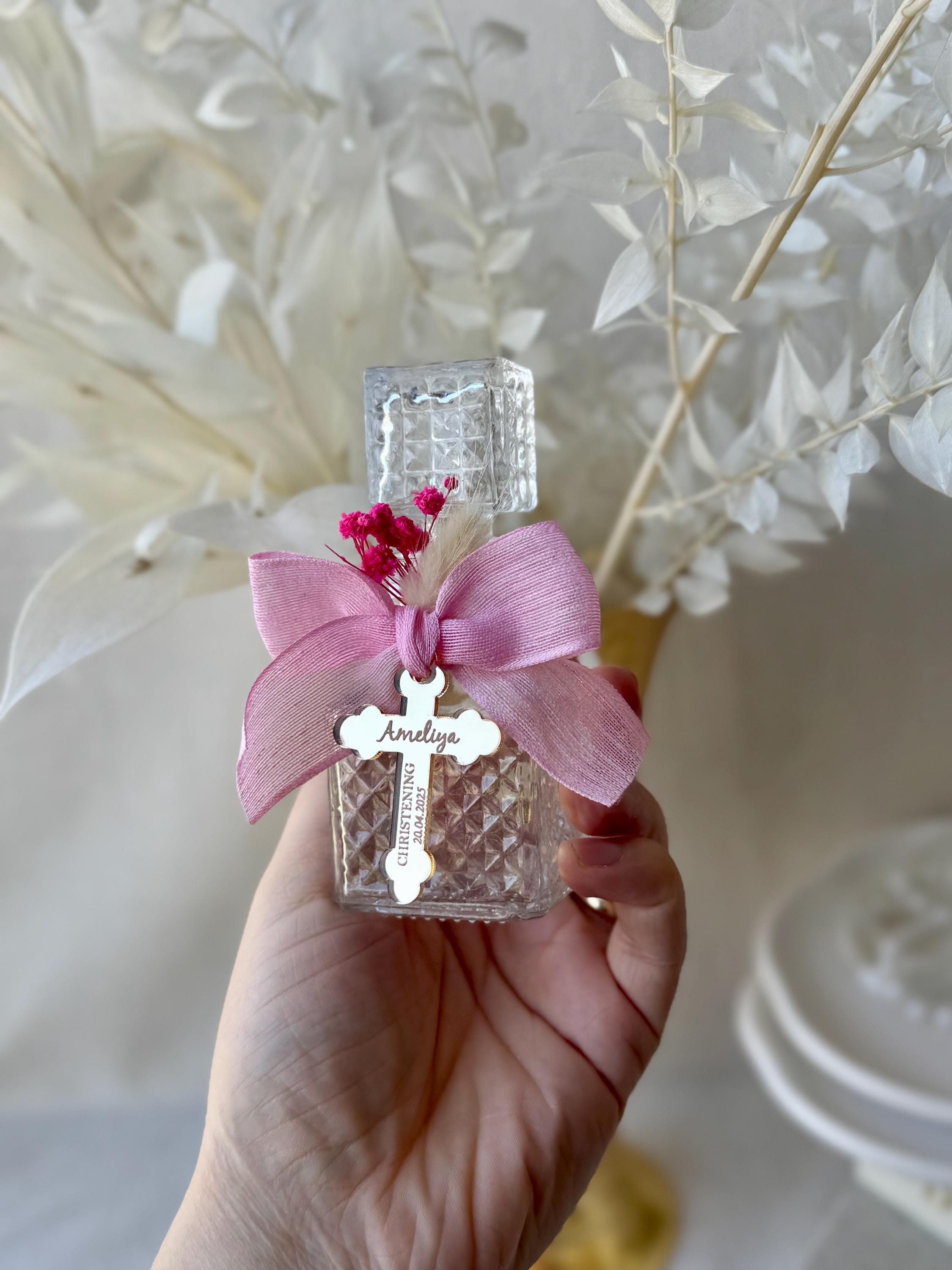 Girl&#39;s Baptism Favor Pink Glass Bottle First Communion Gift Religious Keepsake Dried Baby&#39;s Breath Design Special Occasion Display Multiple Charm Options Available Silver Gold Finish Beautiful Table Decoration Sacred Celebration Memory